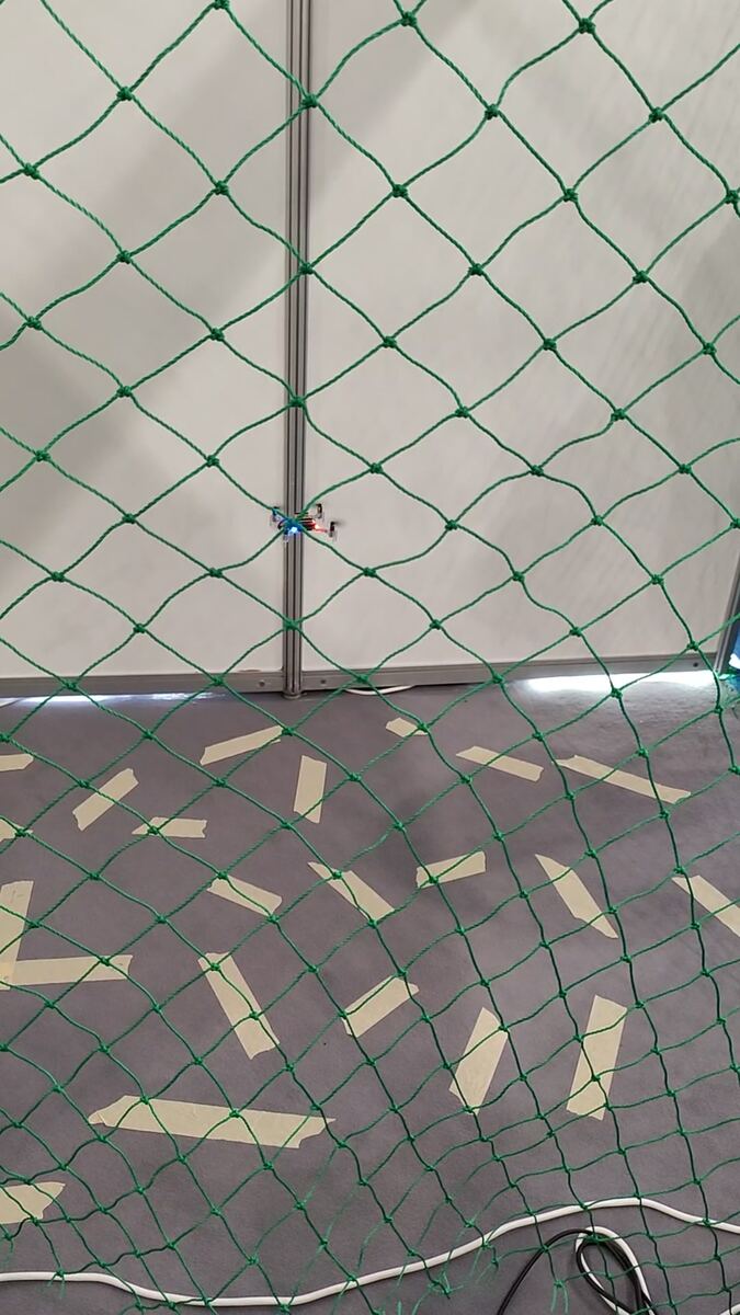 Crazyflie 2.1 flying inside the laboratory drone cage